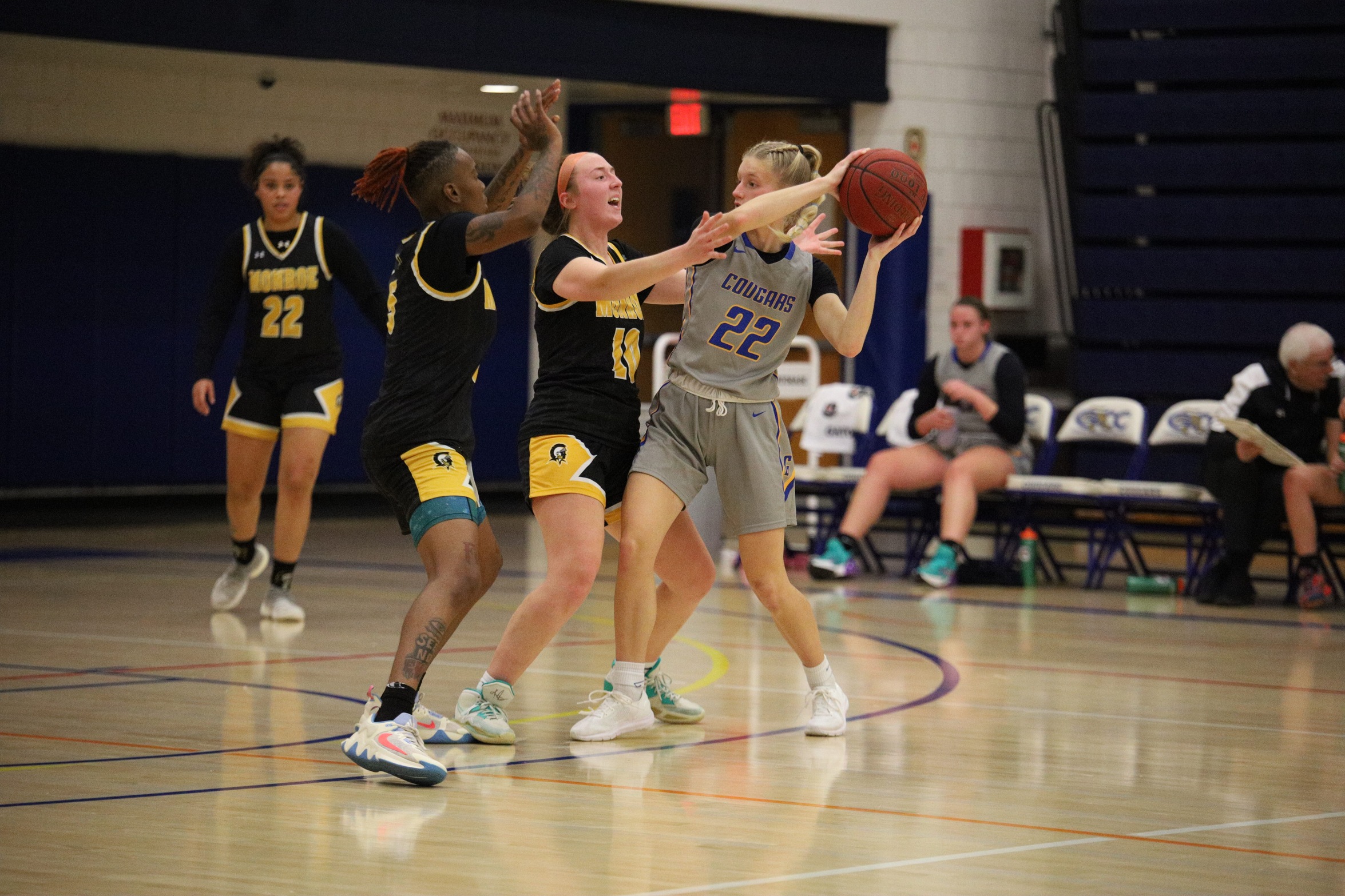 Lady Tribunes Cruise to 64-29 Road Win Over Cougars